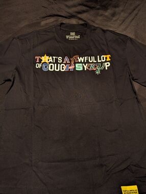 Graphic Black Tee with Colorful 'That's A Awfull Lot Of Cough Syrup' Tee
